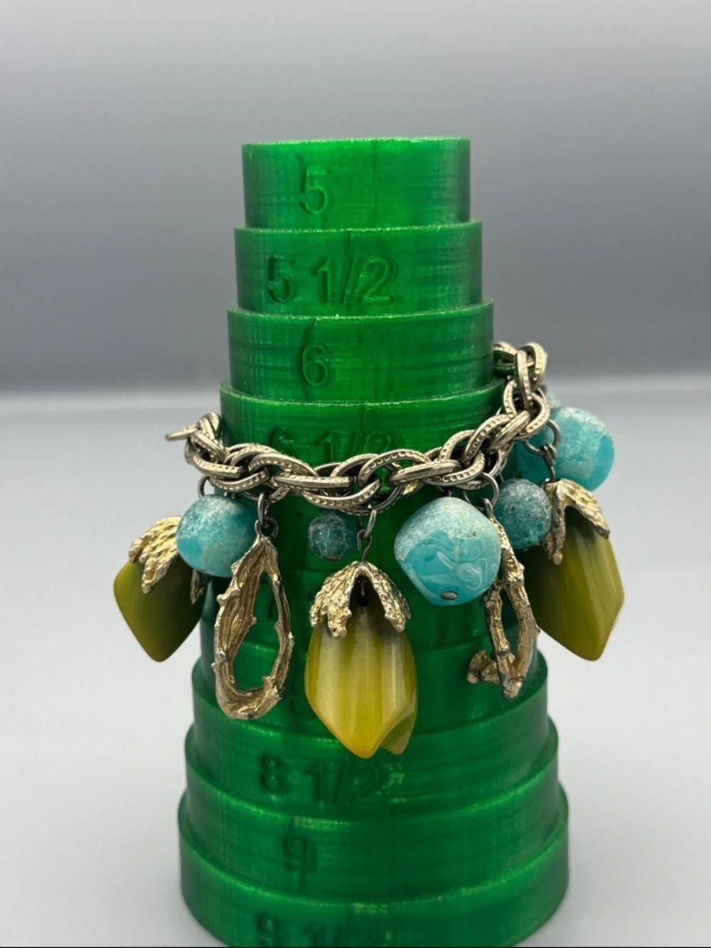 Gold-Tone Charm Bracelet with Teal and Olive Beads